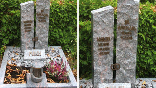 Urnen-Familiengrab: Zwei Steine verbunden durch Ringe.